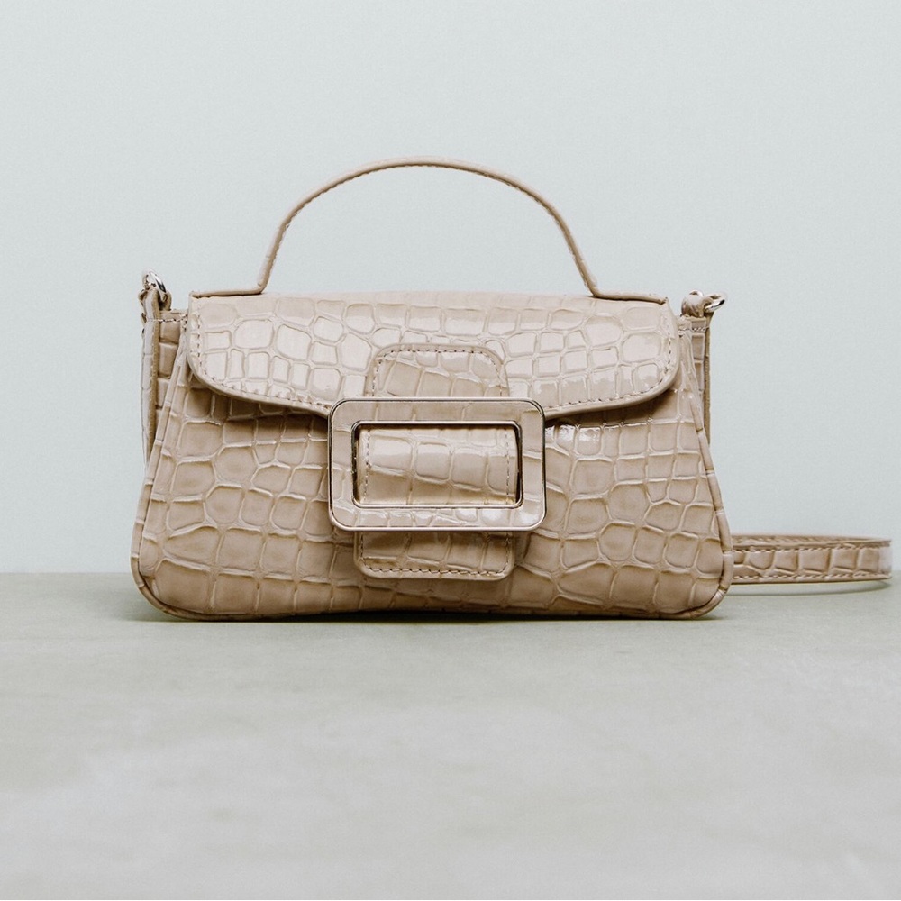 Zara Animal print crossbody bag with buckle.